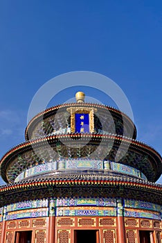 Chinese ancient Temple of Heaven. Asian architectural background. unique round roof of the temple on the blue sky background,