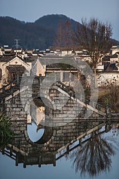 Chinese ancient water village with tradition bridge, house, culture and reflection