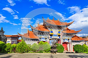 Chinese Arched Entrance under Blue Sky and White Cloud