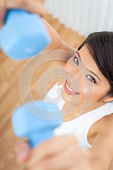 Chinese Asian Woman Girl Exercising With Weights at Home or in a Gym