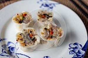 Chinese authentic traditional dish: Cantonese style shumai with rice and pork beef, closeup