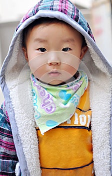 A Chinese baby looking at camera