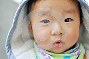 A Chinese baby looking at camera