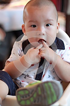 Chinese baby sucking finger