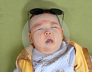 Chinese baby wearing sunglasses