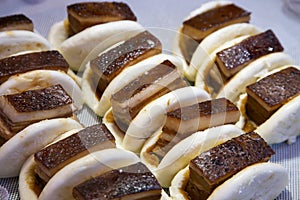 Chinese bao stuffed with roasted pork belly cooked in the Chinese district of Nankinmachi in the city of Kobe in Japan. photo