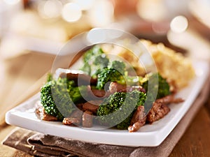 Chinese beef and broccoli stir fry with fried rice