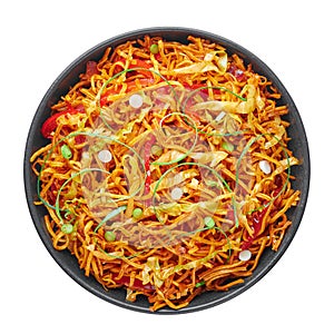 Chinese Bhel in black bowl isolated on white backdrop. ndo-Chinese cuisine street food dish with schezwan sauce