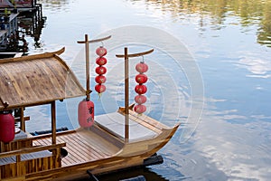 Chinese boat at Ban Rak Thai village in Mae Hong Son province, Thailand. Chinese characters on red lantern - Translated text means