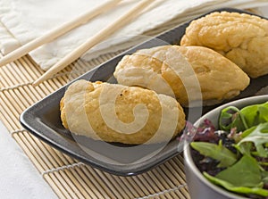 Chinese bread on black plate
