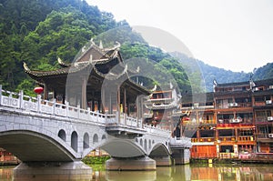 A chinese bridge over the tuojiang river