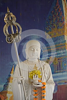 Chinese Buddha with titled trident image