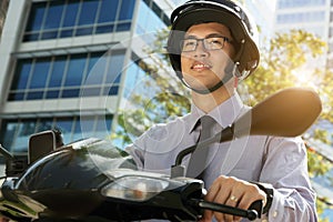 Chinese Businessman Commuter With Scooter Motorcycle In The Morn