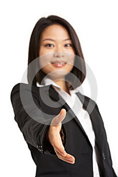 Chinese Businesswoman Reaching Out To Shake H