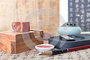 Chinese calligraphy and seal carving art works and tools on the desk