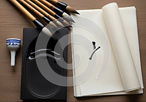 Chinese calligraphy set includes bamboo brushes with black