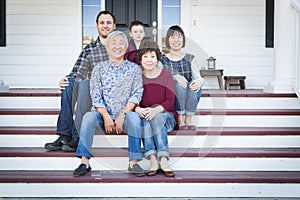 Chinese and Caucasian Family Sitting on Front Porch