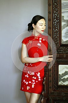 Chinese cheongsam model in Chinese classical garden