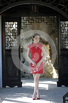 Chinese cheongsam model in Chinese classical garden