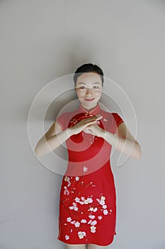 Chinese cheongsam model gesturing