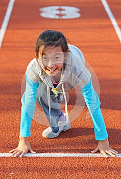 Chinese child prepares to start running