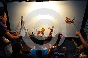 Chinese children shadow play performances