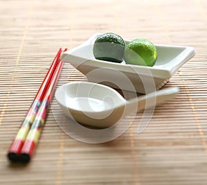 Chinese chopsticks and white ceramic bowl