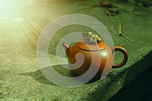 Chinese clay teapot on stone background.High quality photo.