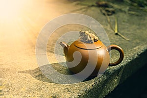 Chinese clay teapot on stone background.High quality photo.