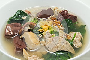 Chinese clear soup with boiled entrails photo