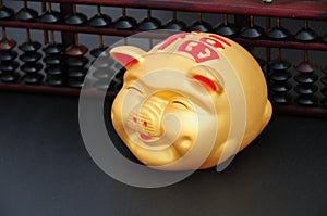 Chinese Coin or piggy bank with Chinese abacus