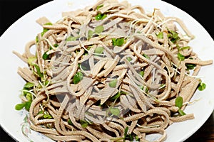 Chinese cold dish - - Chinese toon sprouts mixed with shredded tofu.