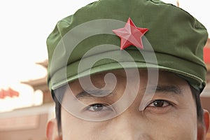 Chinese Communist Solider Wearing Hat With a Star, Close-Up