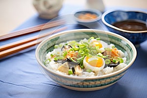 chinese congee with century eggs and scallions