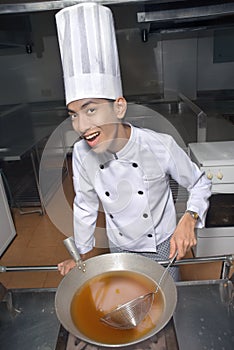 Chinese cook cooking soup