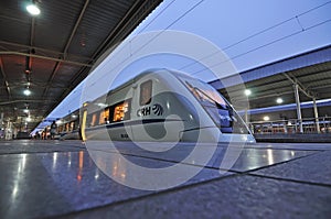 Chinese CRH fast train pass railway station