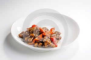 Chinese Deep Fried Pork With Sweet and Sour Sauce and pepper isolated on white background