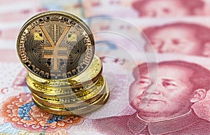 Chinese digital currency, conceptual image of the digital Yuan, or e-RMB, on old yuan banknotes