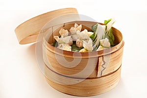 Chinese dim sum dumplings in bamboo basket