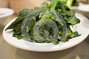 Chinese dim sum - gai lan (chinese greens) photo