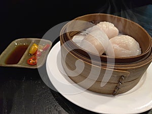 Chinese dim sum Har gow in bamboo basket