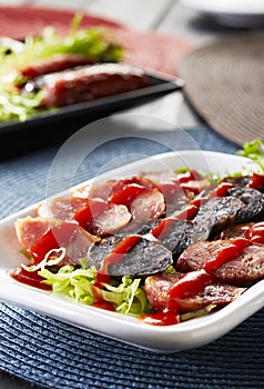 Chinese dishes, the sliced tasty chorizo sausage photo