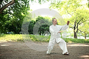 Chinese do taichi outside