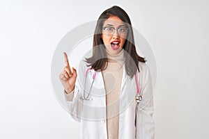 Chinese doctor woman wearing coat and pink stethoscope over isolated white background pointing finger up with successful idea