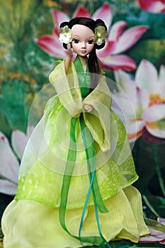 Chinese doll playing taichi photo