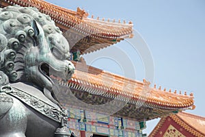 Chinese dragon lion statue in front of traditional Chinese building Forbidden City, Beijing, China