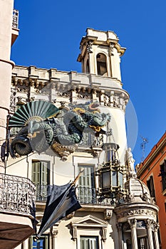 Chinese dragon on 19th century House of Umbrellas (Casa Bruno Cuadros) on La Rambla in Barcelona, Catalonia, Spain, photo