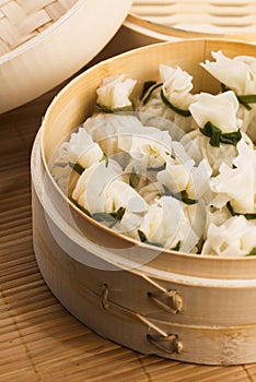 Chinese dumplings in bamboo steamers