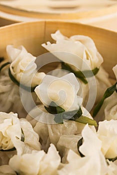 Chinese dumplings in bamboo steamers