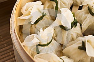 Chinese dumplings in bamboo steamers